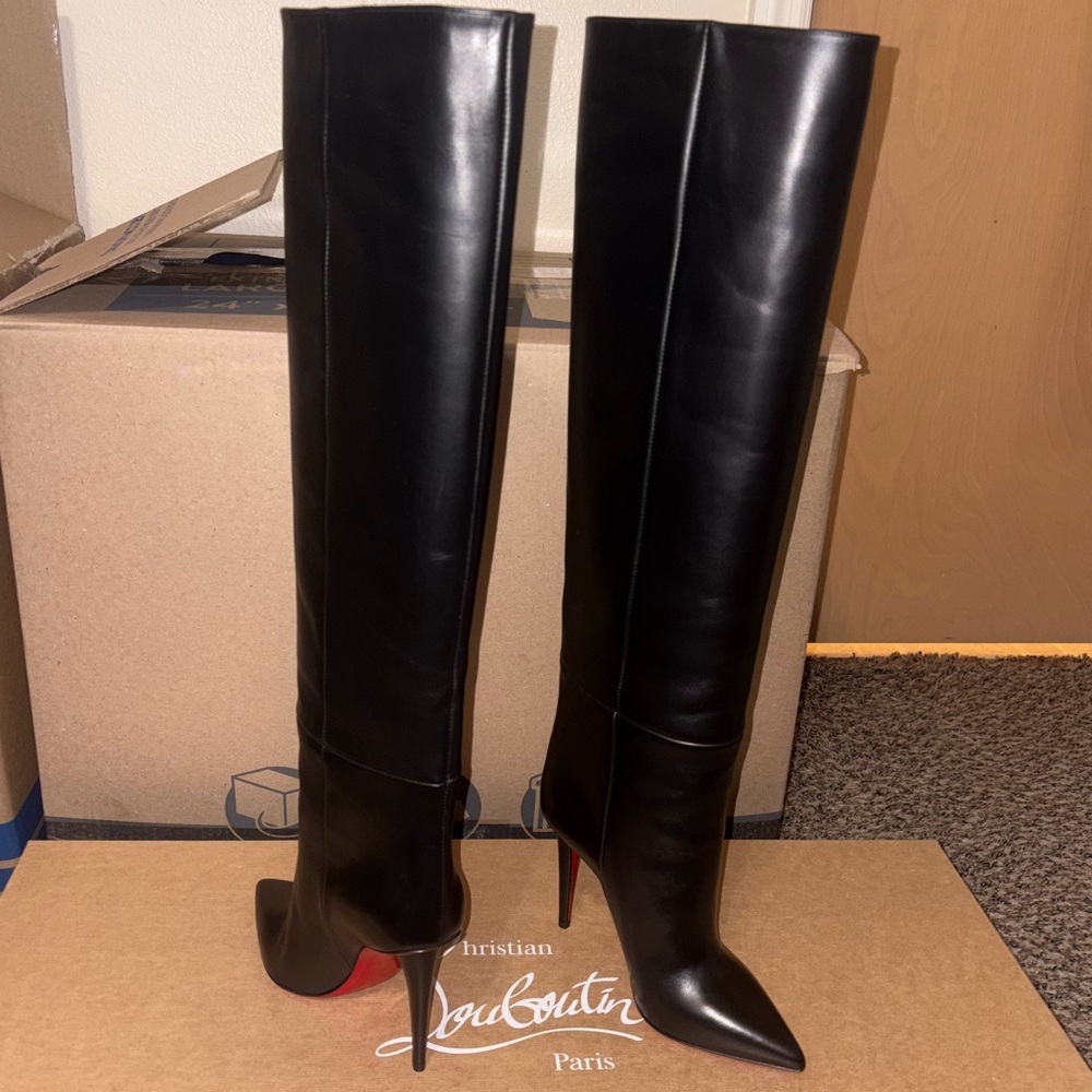 christian louboutin black boot brand new never worn